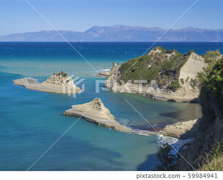 Aerial view on of white rock steep cliff volcanic 59984941
