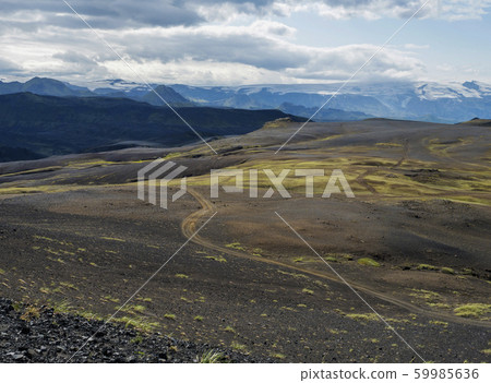Icelandic lava desert landscape with view on 59985636