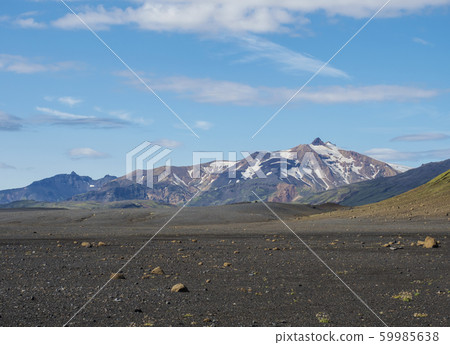 Icelandic lava desert landscape with view on 59985638