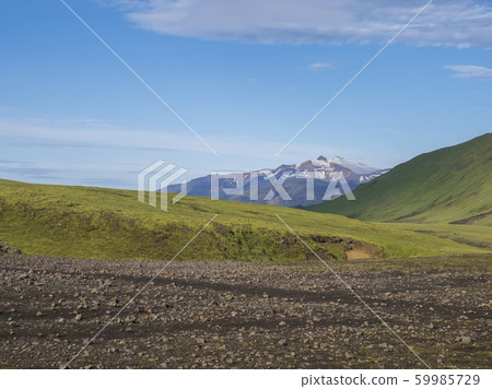 Volcanic landscape with snow-capped mountains of 59985729