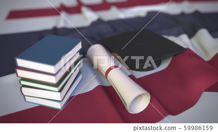 Graduation cap, books and diploma on the Thai flag. Higher education in Thailand related conceptual 3D rendering 59986159