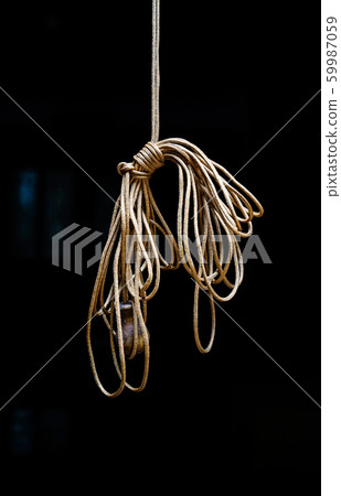 Rope knot on black background 59987059