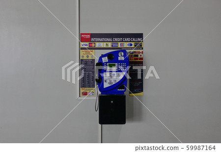 A pubic telephone at Manila Airport A pubic telephone at Manila Airport 59987164