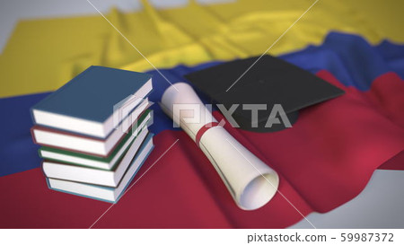 Graduation cap, books and diploma on the Colombian flag. Higher education in Colombia related conceptual 3D rendering 59987372