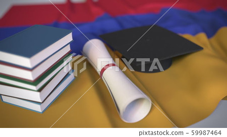 Graduation cap, books and diploma on the Armenian flag. Higher education in Armenia related conceptual 3D rendering 59987464