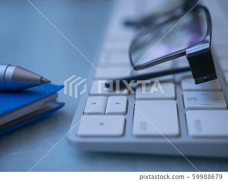 Business image · notebook · glasses · keyboard 59988679