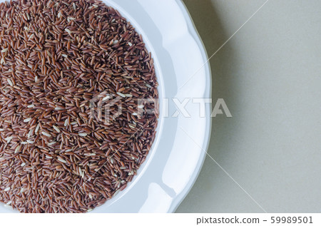 Close up rice berry in the bowl. Close up rice berry in the bowl. 59989501