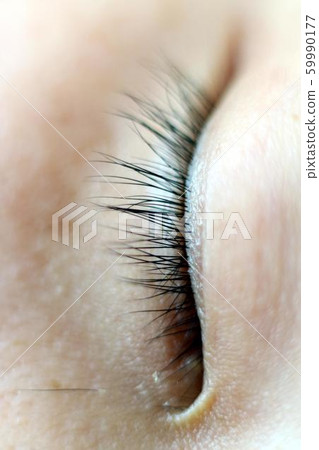 Closed eyes and long eyelashes Closed eyes and long eyelashes 59990177