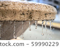 Water drop of the fountain 59990229