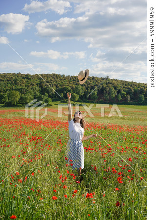 Tourist woman enjoying the fantastic view in 59991959