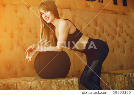 Fitness girl in a gym 59993390