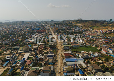 Cars traffic in Sihaoukville city streets, Drone shot Cars traffic in Sihaoukville city streets, Drone shot 59996587