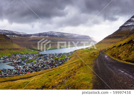 City of Klaksvik with a dirt road on Faroe Islands, Denmark 59997438