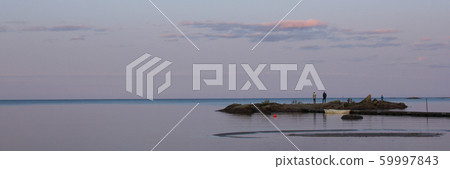 Shore of Lake Vanern in the blue hour. 59997843