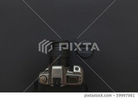 Photographer workplace with dslr camera system on 59997981