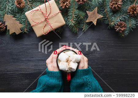 Christmas composition of fir branches, wooden toys Christmas composition of fir branches, wooden toys 59998220
