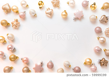 Christmas frame of golden and pink balls on white 59999199