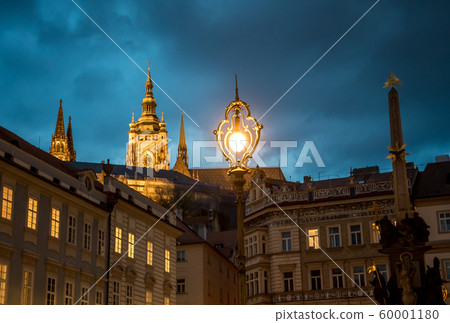 Saint Vitus Cathedral And Old Buildings With Bright Streetlight On Hradcany In Prague In The Czech Republic Saint Vitus Cathedral And Old Buildings With Bright Streetlight On Hradcany In Prague In The Czech Republic 60001180