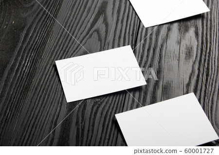 Business card blank on wooden background. Corporate Stationery, Branding Mock-up. Creative designer desk. Flat lay. Copy space for text Business card blank on wooden background. Corporate Stationery, Branding Mock-up. Creative designer desk. Flat lay. Copy space for text 60001727