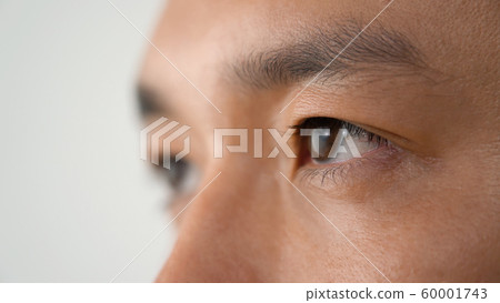 Close up of male eyes 60001743