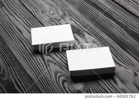 Business card blank on wooden background. Corporate Stationery, Branding Mock-up. Creative designer desk. Flat lay. Copy space for text Business card blank on wooden background. Corporate Stationery, Branding Mock-up. Creative designer desk. Flat lay. Copy space for text 60001762