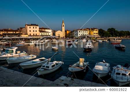 Picturesque Village Fazana In Croatia With Old Church And Boats In Harbor 60001922