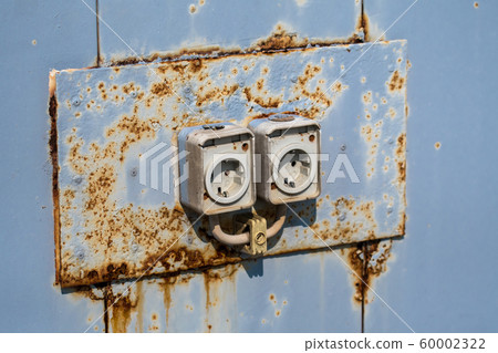 Two Old Rusty Electric Wall Sockets 60002322