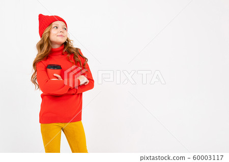 European pretty girl in red posing with a glass of coffee in her hands on a white background 60003117