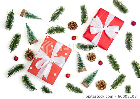 Christmas holiday composition with red gift box and decoration isolated on white background Christmas holiday composition with red gift box and decoration isolated on white background 60005108