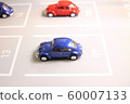 Miniatures of cars lined up in the parking lot 60007133