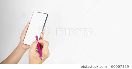 Close-up of hand holding smartphone with pen Close-up of hand holding smartphone with pen 60007339