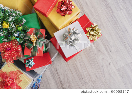 Gift boxes, Christmas present on wooden floor 60008147
