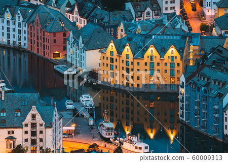 Alesund, Norway. Night View Of Alesund Skyline Cityscape. Historical Center In Summer Evening. Famous Norwegian Landmarks And Popular Destination 60009313