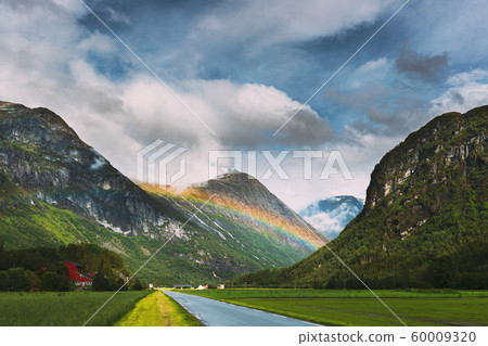 Stardalen, Skei I Jolster, Jostedalsbreen National Park, Norway. Beautiful Sky After Rain With Rainbow Above Norwegian Rural Landscape. Agricultural And Weather Forecast Concept 60009320