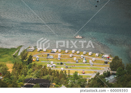Geirangerfjord, Norway. Caravan Motorhome Cars Parking Near Harbor. Aerial View In Summer Day 60009393