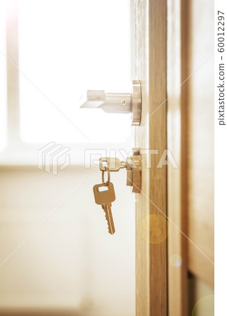 Door lock , door open in front of room blur background 60012297