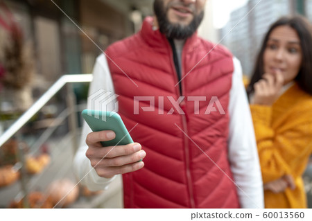 Selective focus of a modern gadget in male hands Selective focus of a modern gadget in male hands 60013560