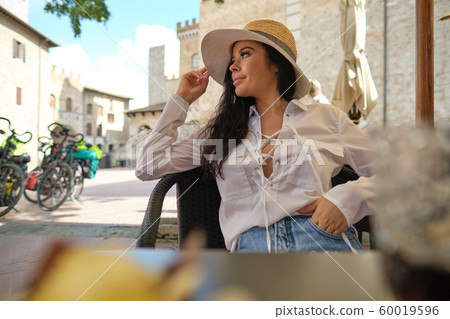 beautiful woman in summer dress walking and beautiful woman in summer dress walking and 60019596