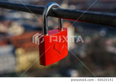 Wedding red lock with heart on a handrail. Wedding red lock with heart on a handrail. 60020141