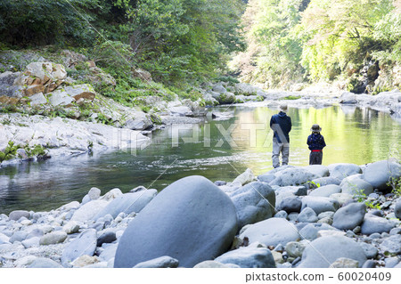 Mountain stream fishing image Parent and child family 60020409