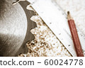 Saw Blade and Woodwork tools on the boards background 60024778