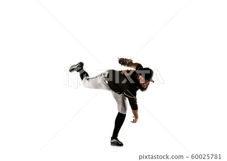 Baseball player, pitcher in a black uniform practicing on a white background. Baseball player, pitcher in a black uniform practicing on a white background. 60025781