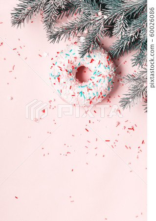 Christmas ball made of glazed donut and sugar Christmas ball made of glazed donut and sugar 60026086