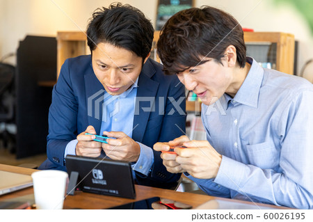 Men playing games Men playing games 60026195