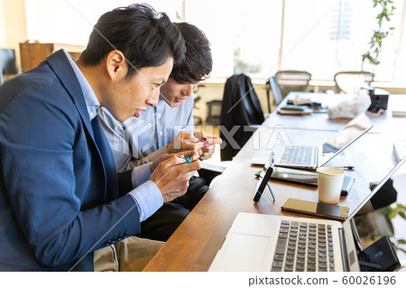 Men playing games Men playing games 60026196