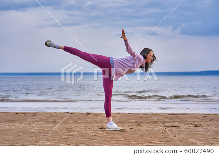 A young woman with long black hair 60027490