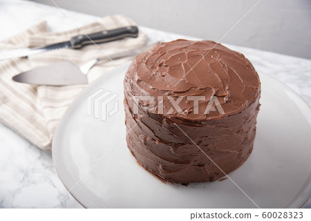 american traditional chocolate cake coated with american traditional chocolate cake coated with 60028323