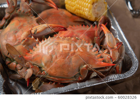 steamed chesapeake blue crab on paper 60028326