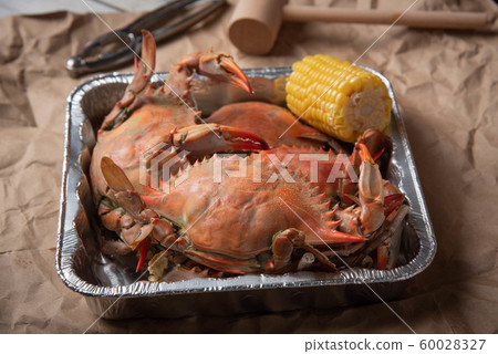 steamed chesapeake blue crab on paper 60028327