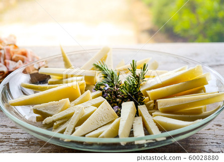 cheese wedges on a plate slices of pecorino 60028880